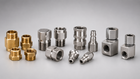 Assortment of brass and stainless steel pressure-washer adapters, fittings, connectors, couplers, and swivels.