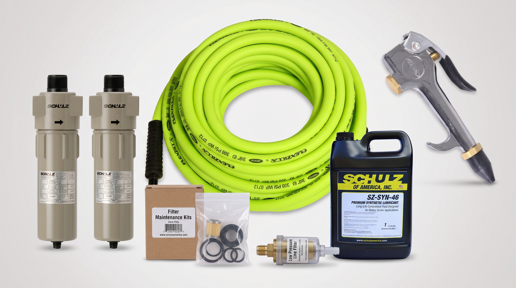 Air compressor accessories including filters, coiled hose, blow gun, maintenance kit, lubricant, and inline pressure filter.