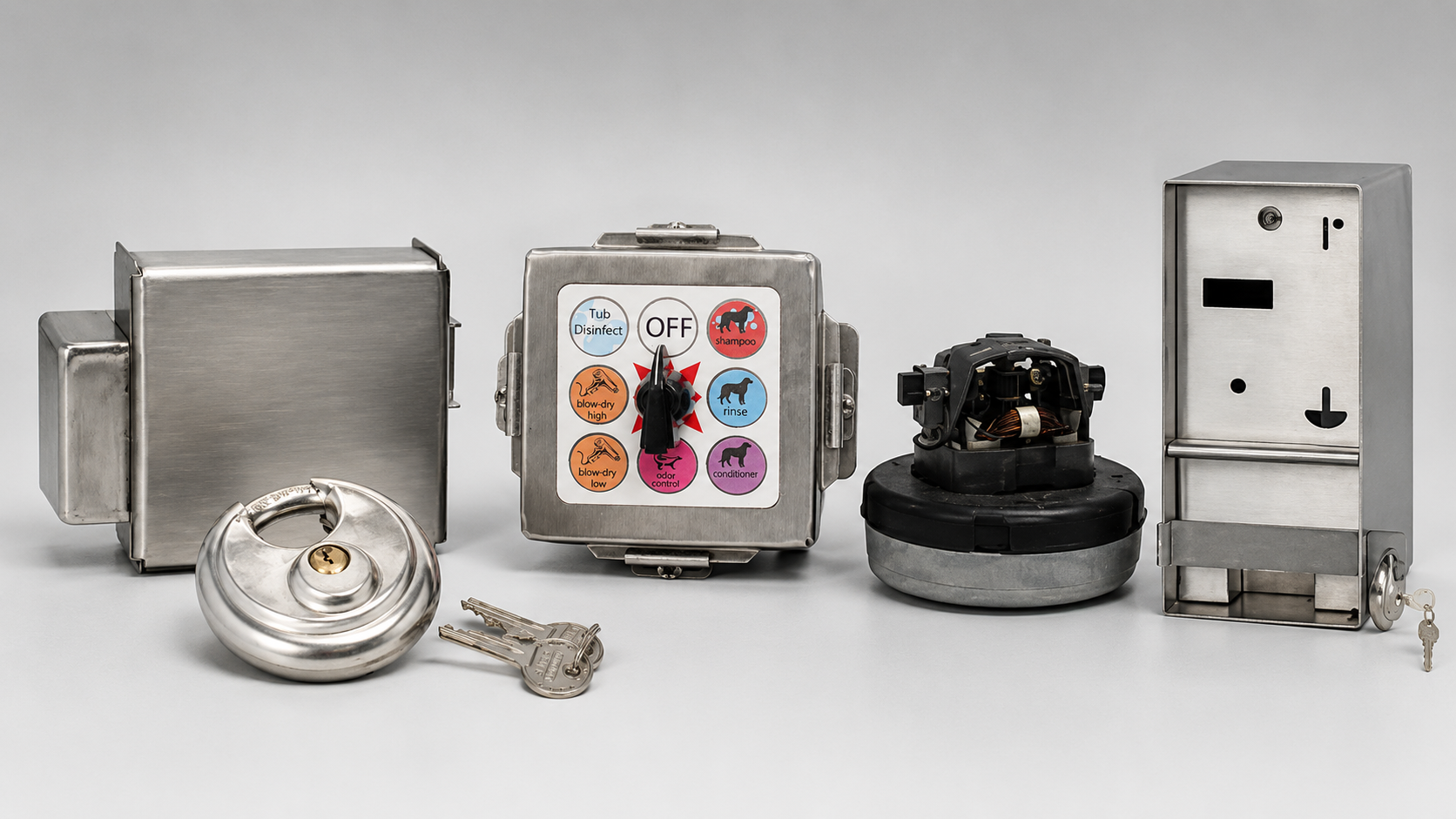 Assortment of car wash parts including control boxes, selector switch, vacuum motor, coin box, lock, and keys.