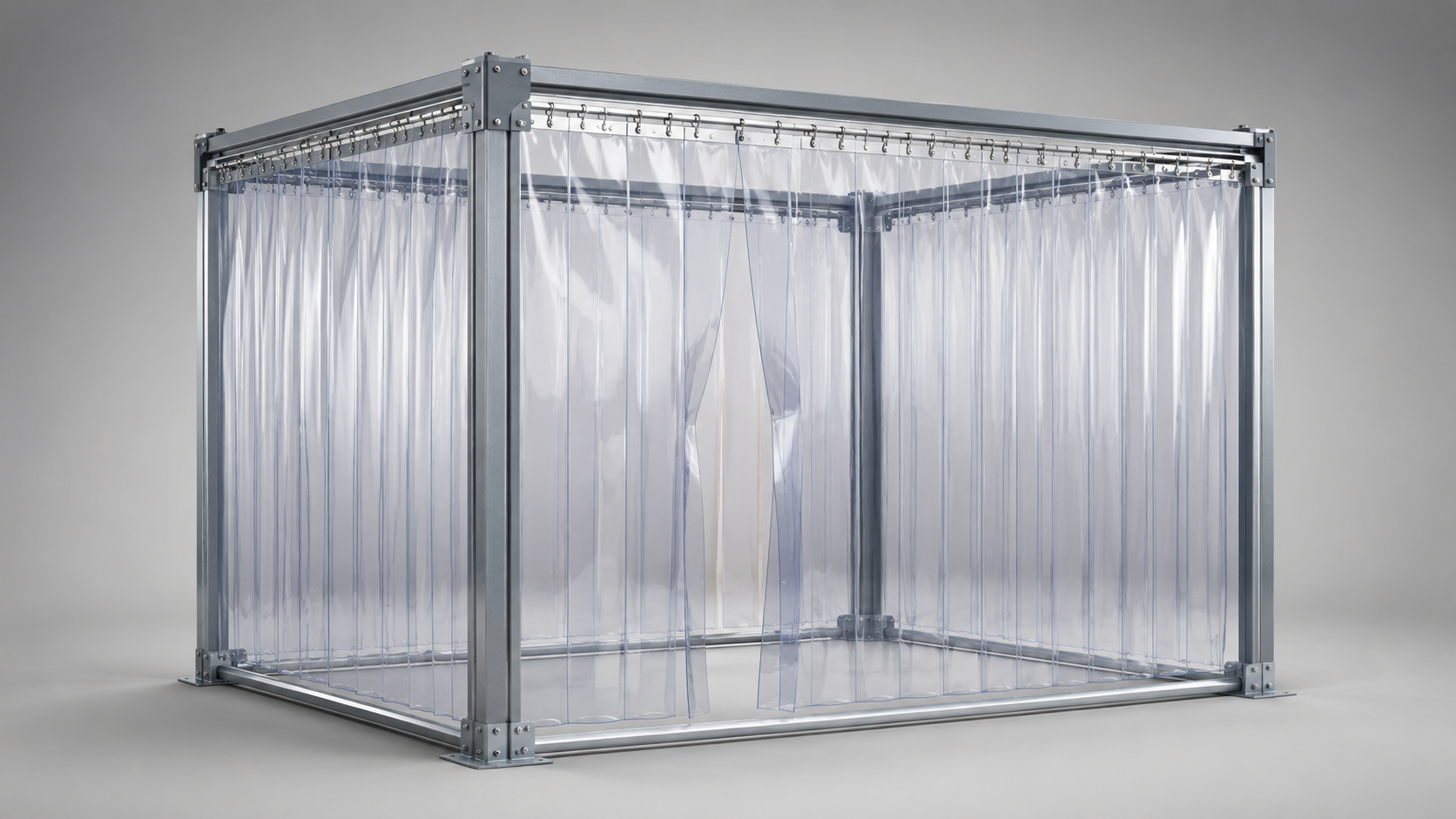 Freestanding industrial enclosure with a metal frame and clear vinyl strip curtain walls.