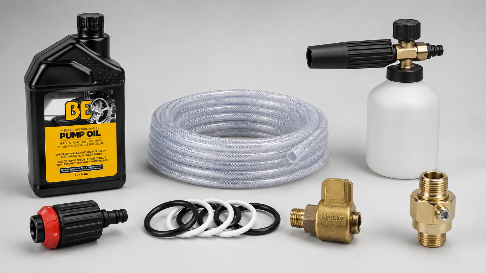 Assortment of pressure-washer accessories, including pump oil, chemical hose, foam cannon, seals, valves, and brass fittings.