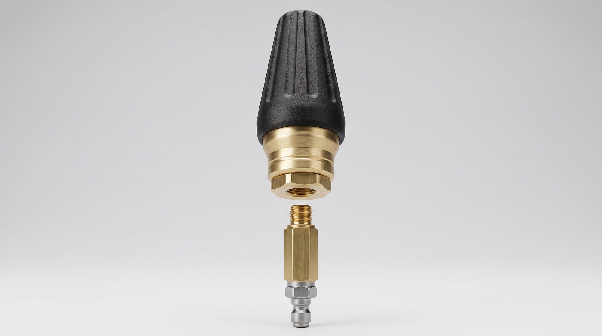 Rotary turbo nozzle with black protective housing, brass body, threaded adapter, and quick-connect fitting.