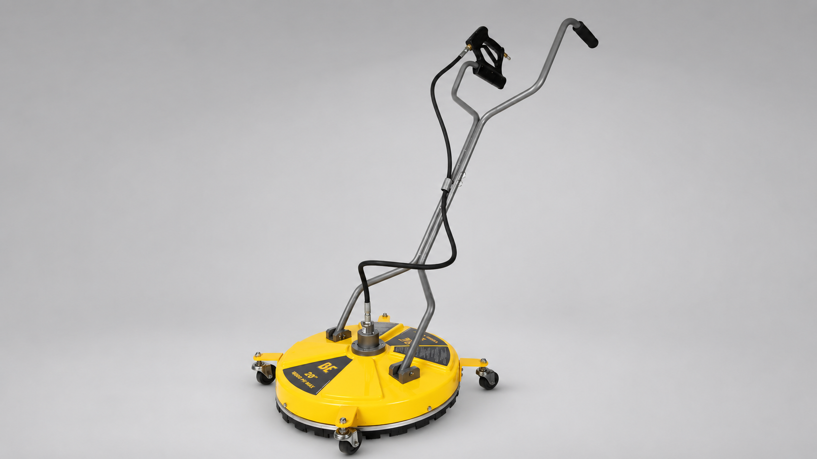 Yellow wheeled pressure-washer surface cleaner with dual handles, trigger gun, hose, and protective brush skirt.