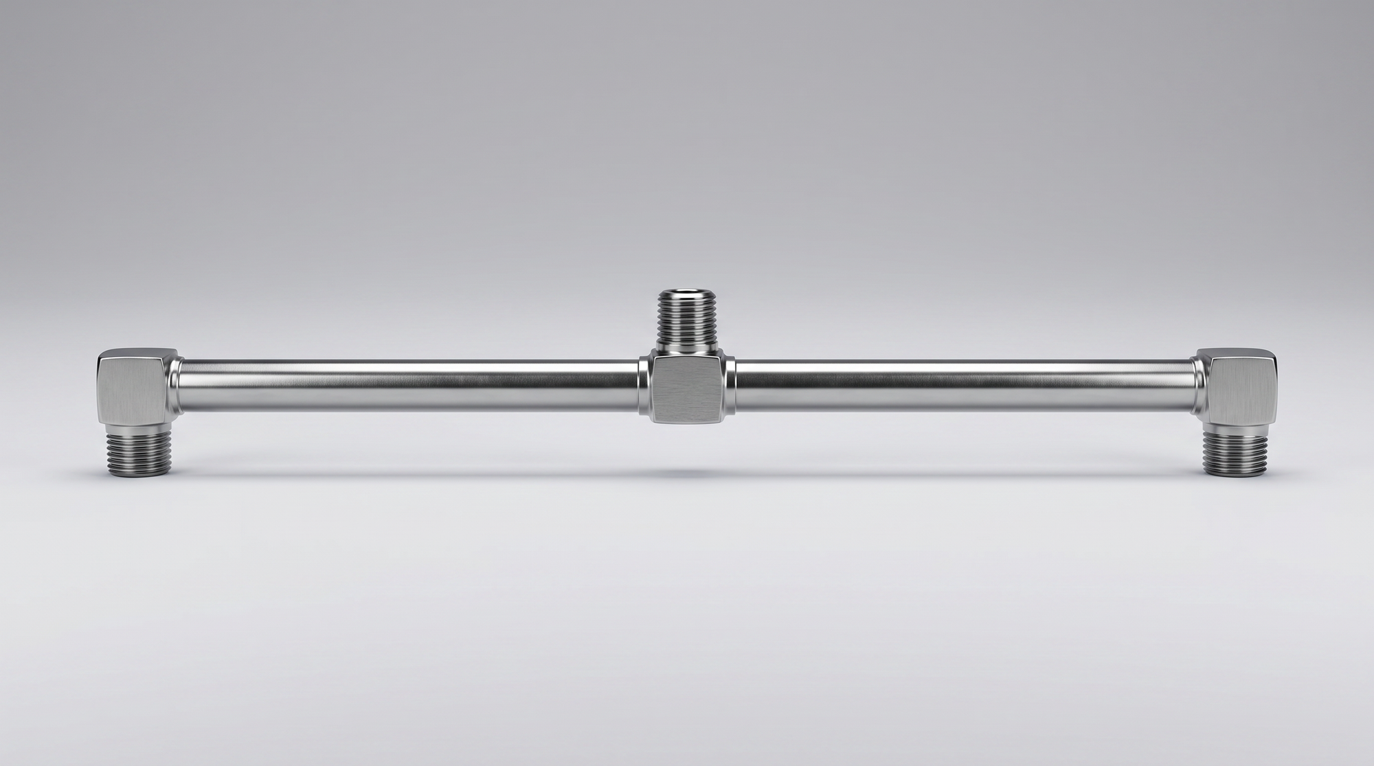 Stainless steel surface-cleaner spray bar with center inlet and angled threaded nozzle connections.