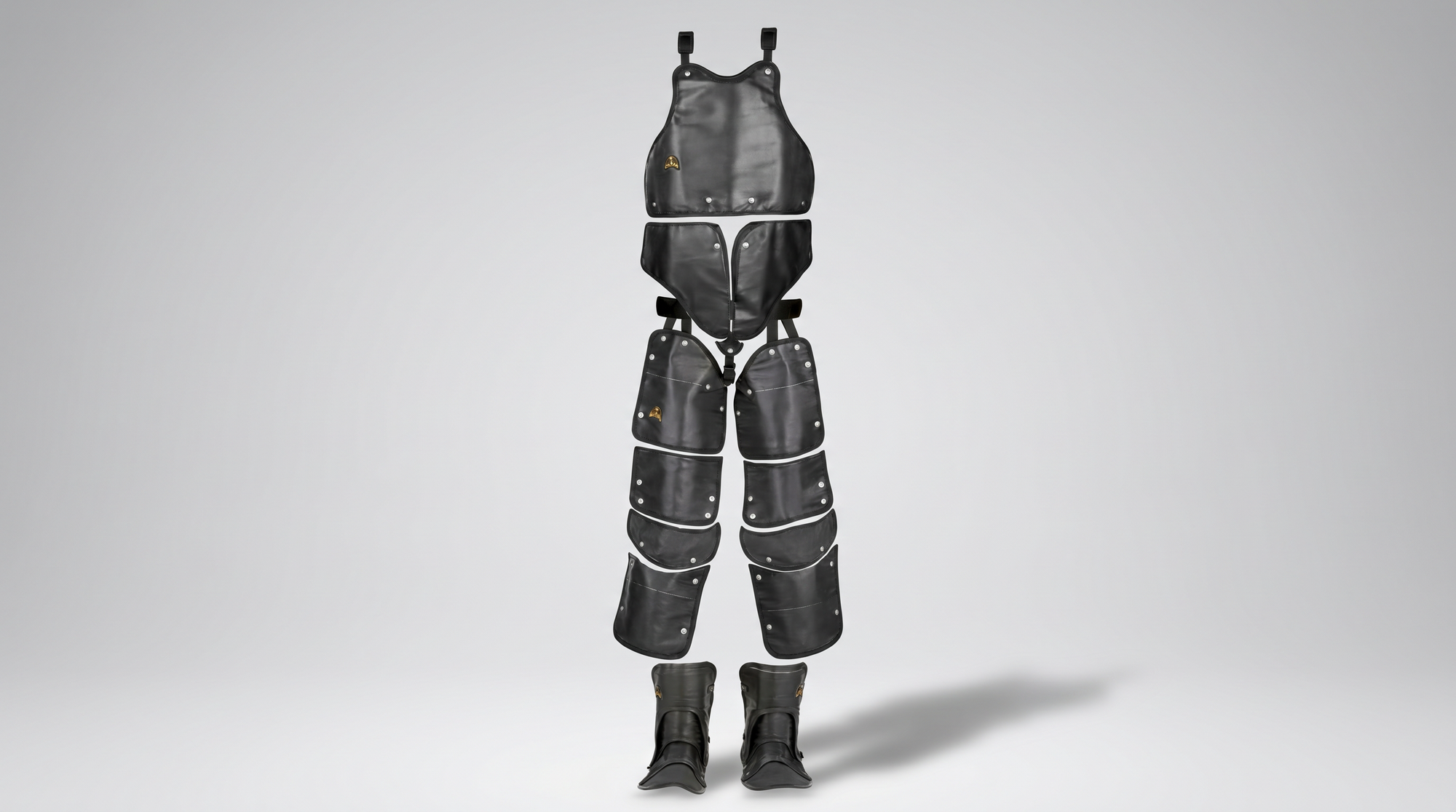 Heavy-duty water blasting safety suit with protective apron, leg guards, thigh panels, and reinforced boots.