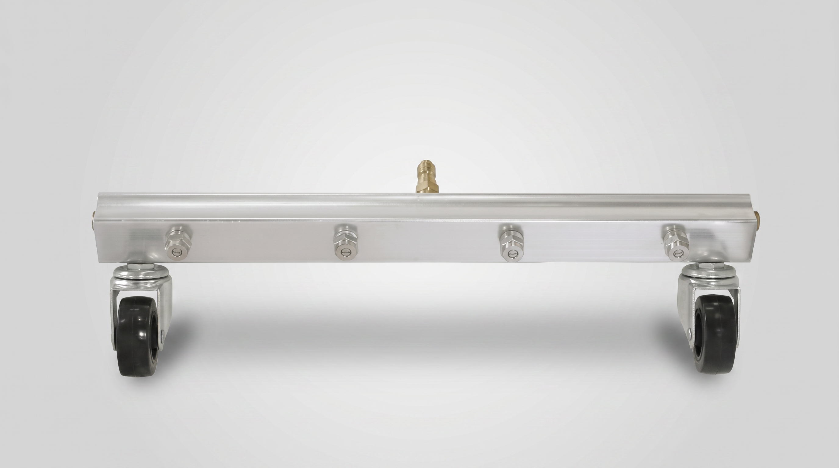 Stainless steel water broom with four spray nozzles, center inlet fitting, and two swivel caster wheels.