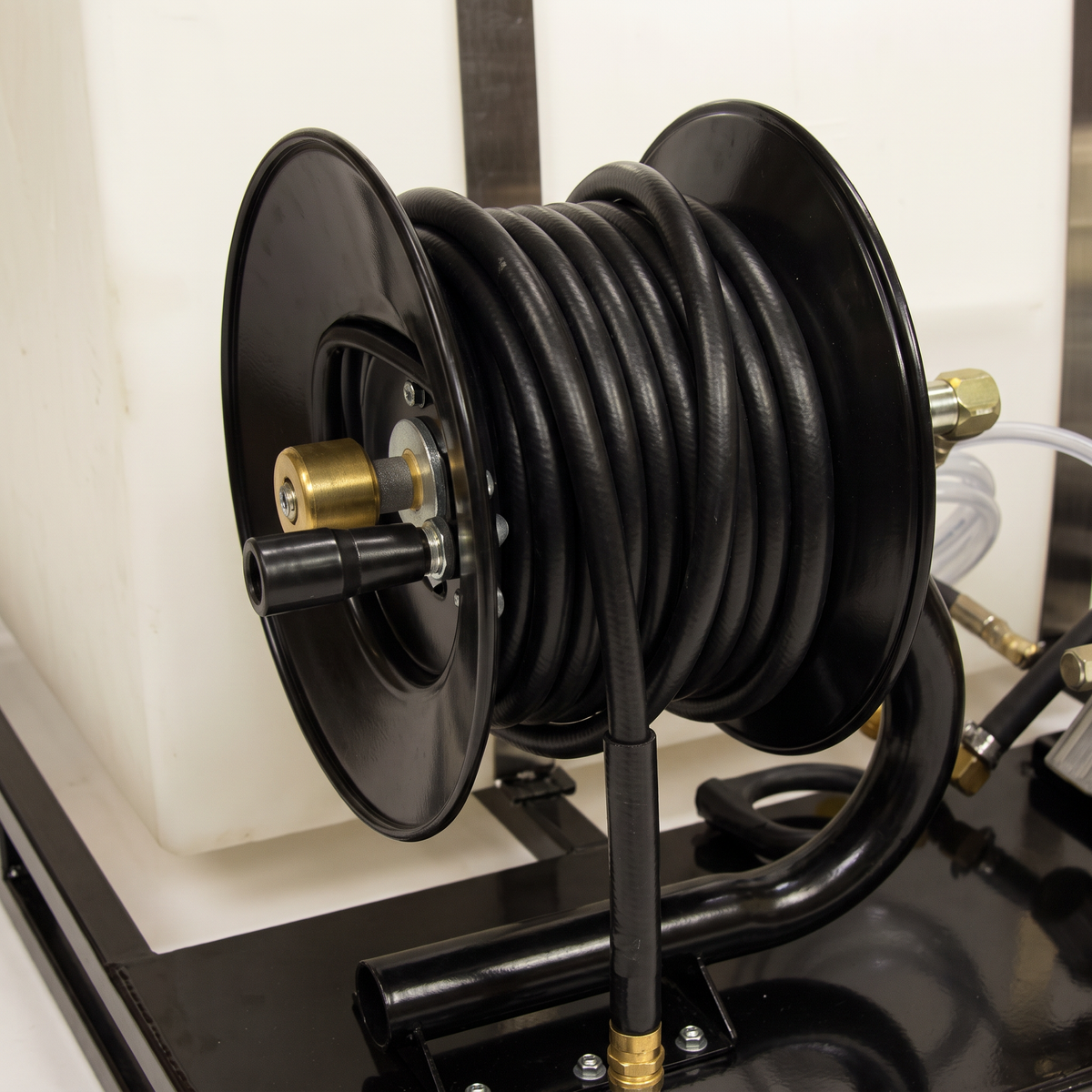 A close-up of the hose reel with 50' wire braided hose of the 3500 PSI Gasoline Power Washer.